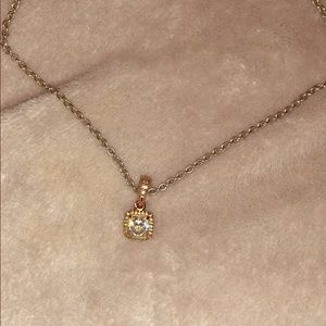pandora necklace with rose gold pendant
